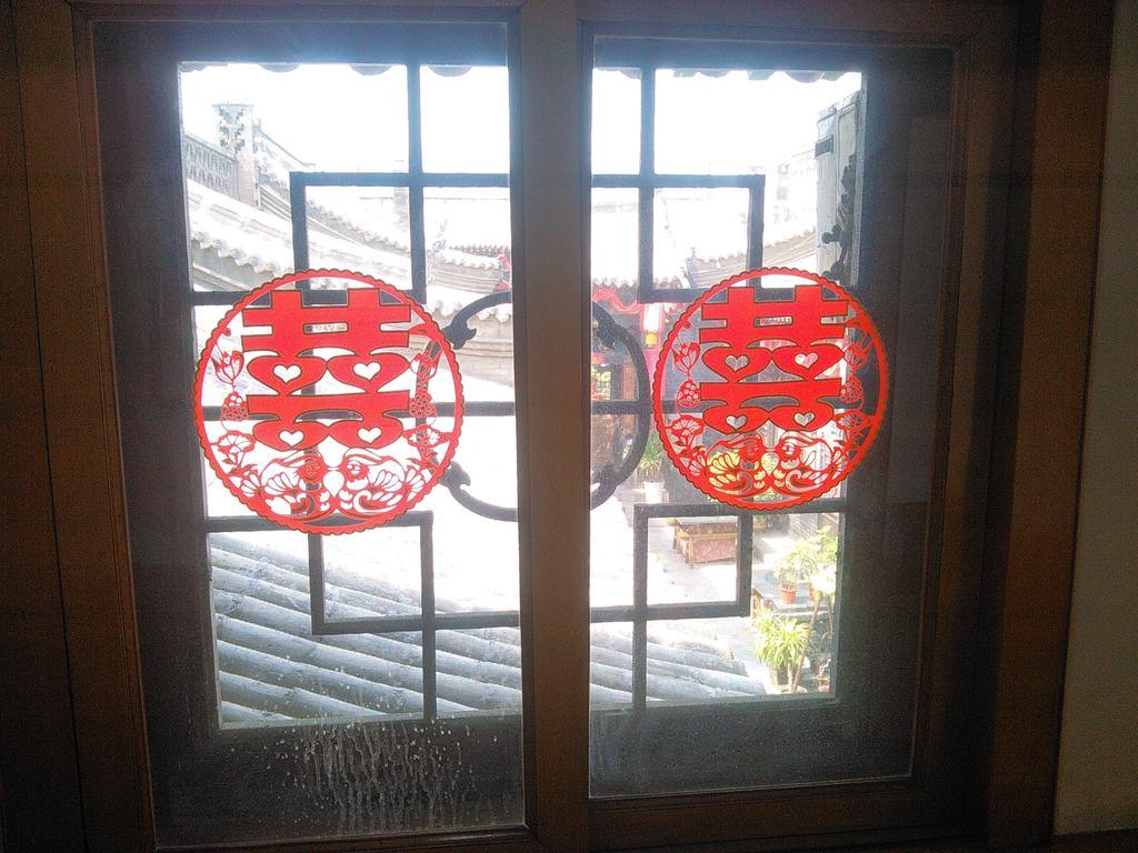 Pingyao Yucheng Yuan Inn Номер фото